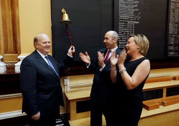 Minister for Finance Michael Noonan rings the bell of the ISE at the launch of Hibernia REIT watched by Kevin Nowlan CEO Hibernia REIT and Deirdre Somers Chief Executive of the ISE